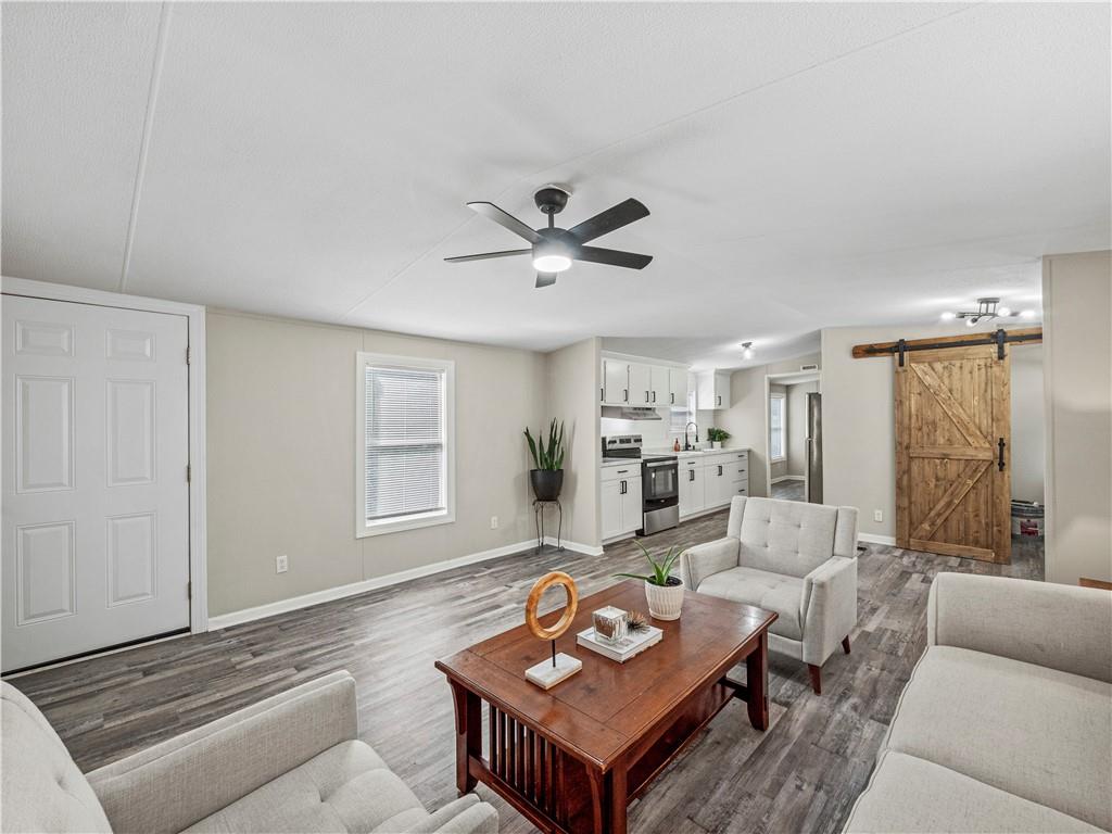 1458 Grant Mill Road Alto, GA 30510 - Photo 19 of 32 a living room with furniture and a window