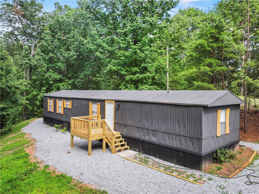 1458 Grant Mill Road Alto, GA 30510 - Photo 7 of 32 a house view with a sitting space and garden