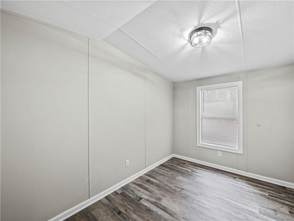 1458 Grant Mill Road Alto, GA 30510 - Photo 9 of 32 a view of empty room with wooden floor