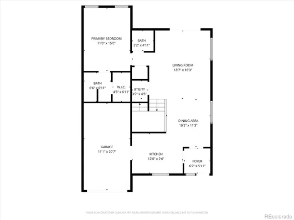 a view of a hallway with entryway with wooden floor