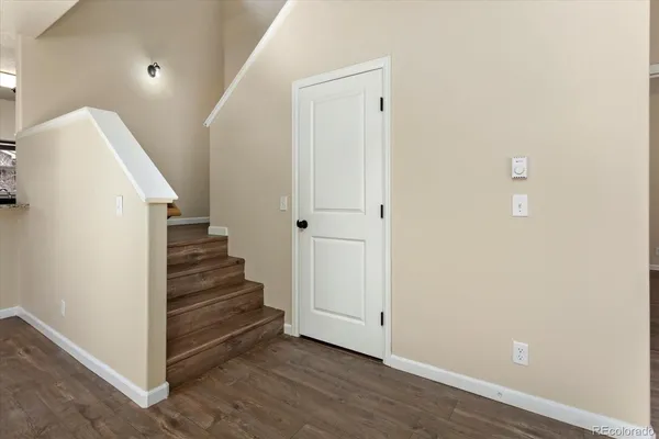 a view of room with window and hallway