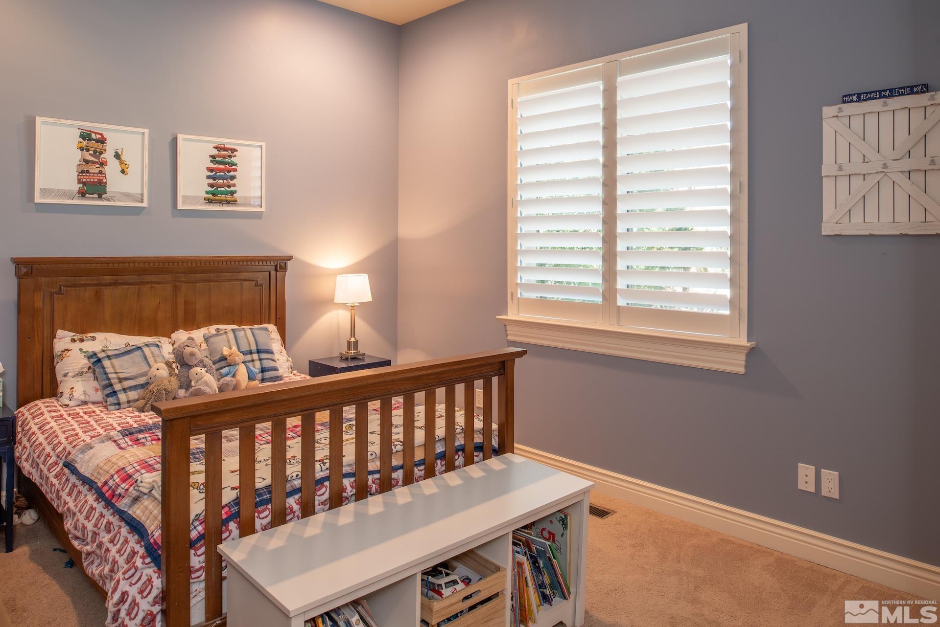 3910 Nature Trail Reno, NV 89511 - Photo 15 of 29 a view of a bedroom with furniture and a window