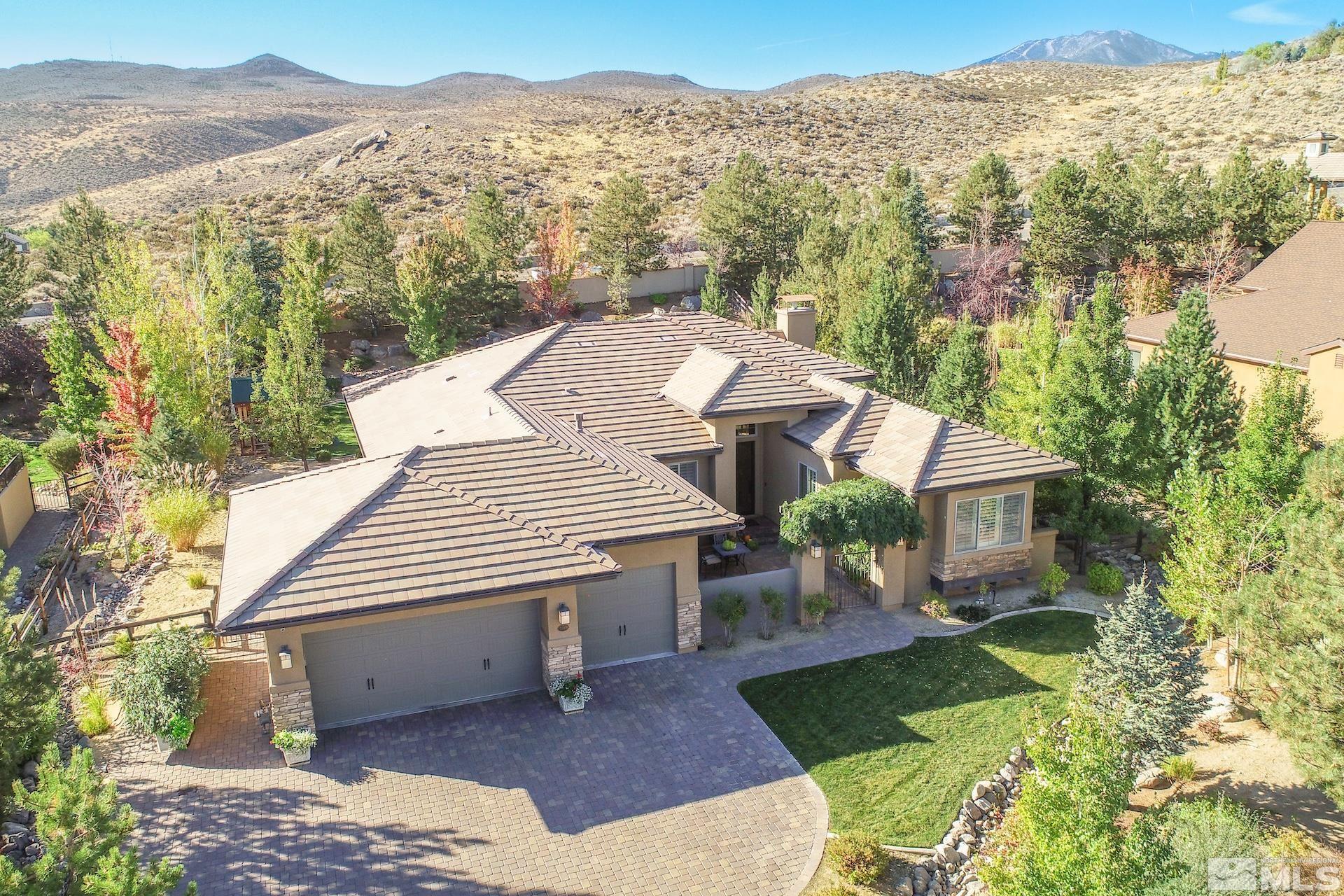 3910 Nature Trail Reno, NV 89511 - Photo 2 of 29 a view of a house with a mountain view