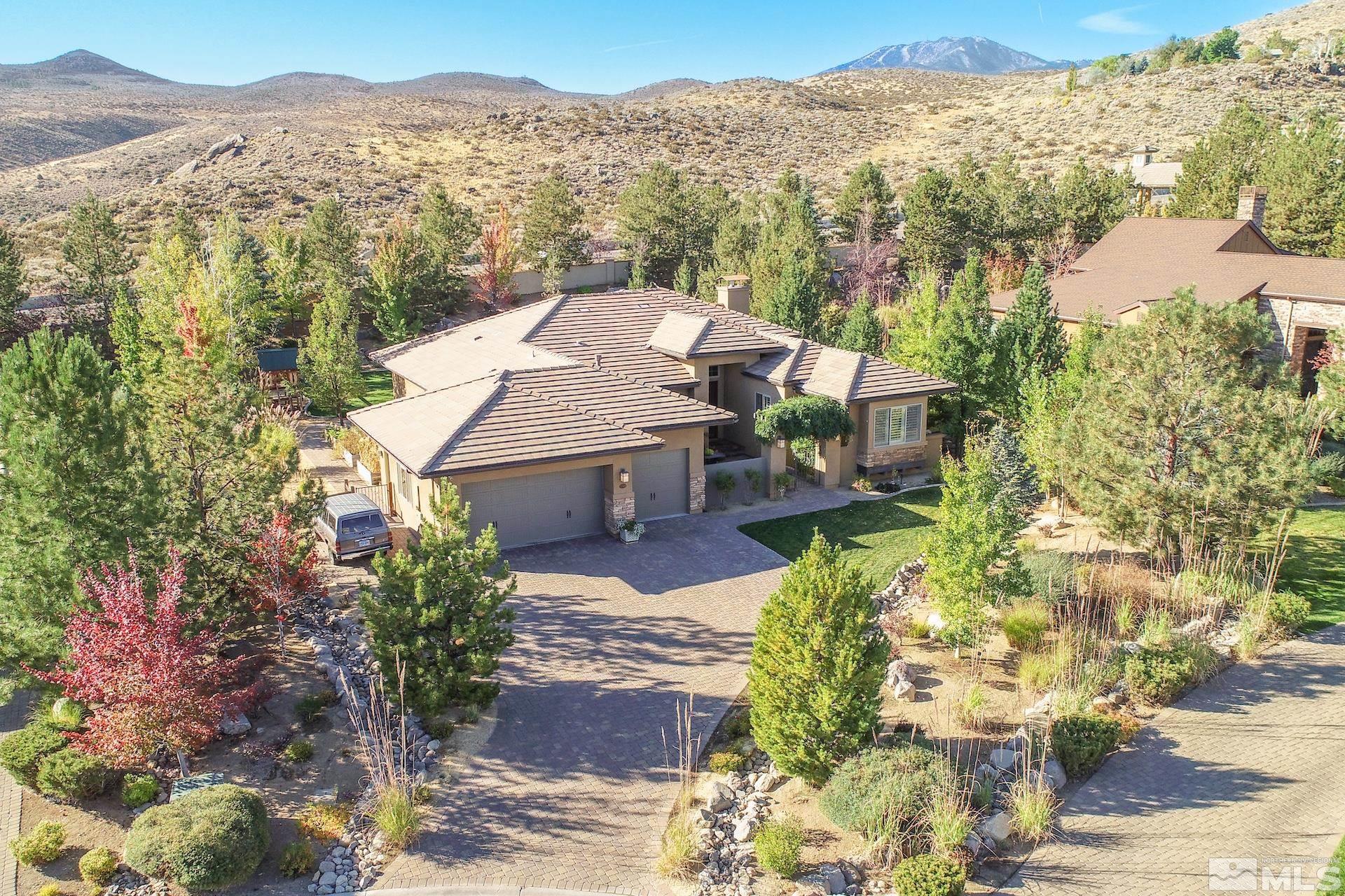3910 Nature Trail Reno, NV 89511 - Photo 29 of 29 a view of a terrace with a garden