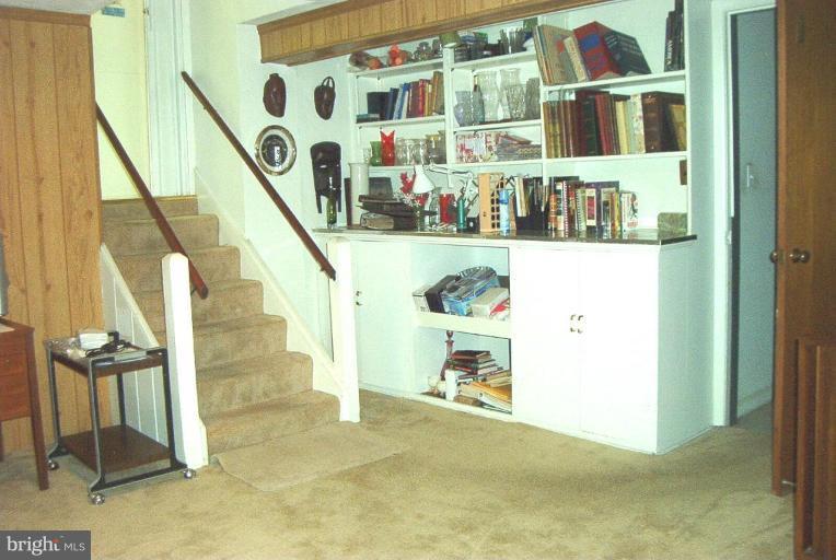 6608 Edenvale Road Baltimore, MD 21209 - Photo 22 of 30 a view of staircase with railing and stairs