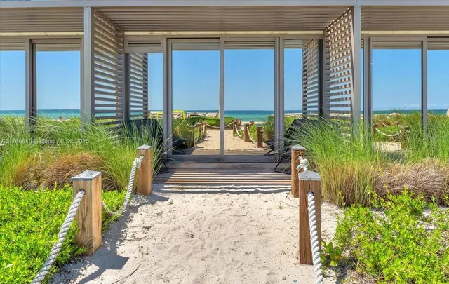 a bedroom with a bed and a table