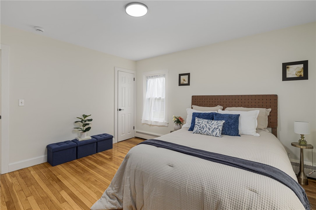 461 River Road Lincoln, RI 02865 - Photo 14 of 32 Main Bedroom with an extended closet, LED lighting, hardwood flooring, and plenty of natural light