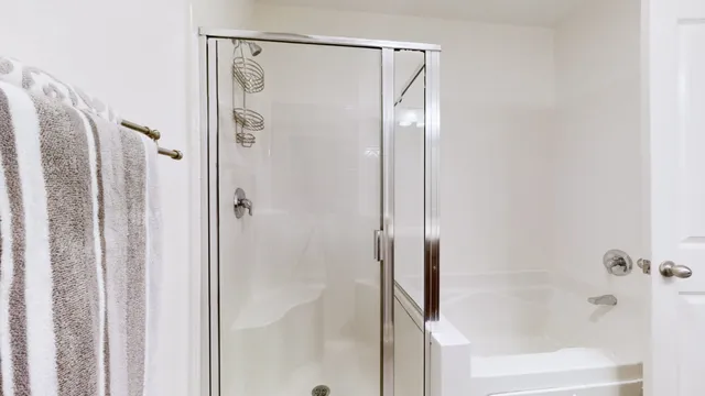 a bed room with a bed and a window