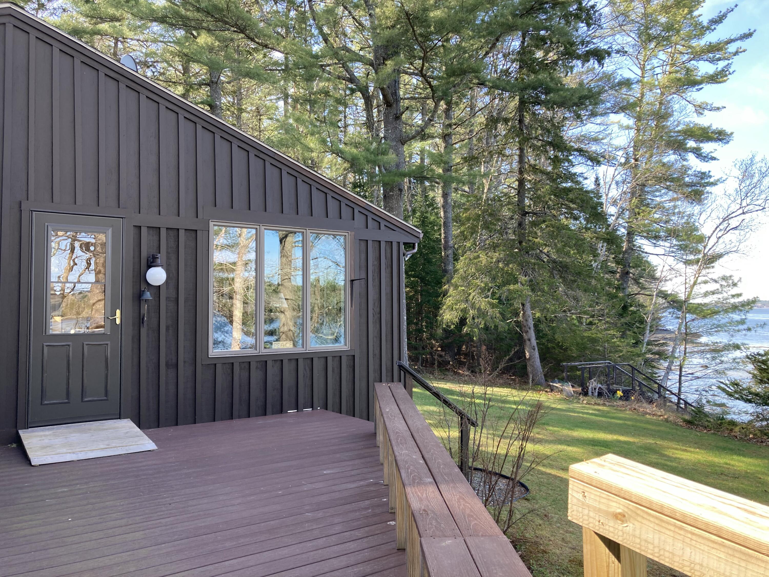 32 Taunton Keep Hancock, ME 04640 - Photo 6 of 25 Waterside deck to entrance.