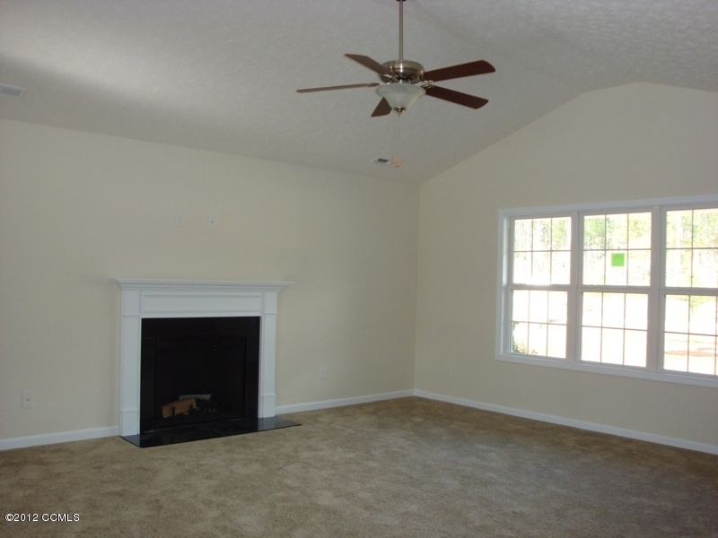 280 Station House Road New Bern, NC 28562 - Photo 2 of 13 Living Room with Cathedral Ceiling