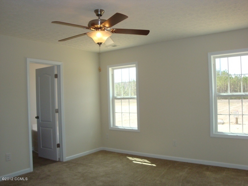 280 Station House Road New Bern, NC 28562 - Photo 8 of 13 Principal Bedroom with Paddle Fan