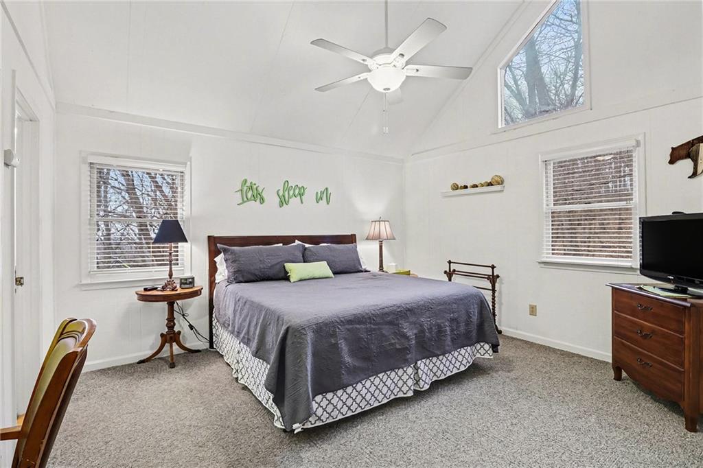 296 Fairview Court Jasper, GA 30143 - Photo 17 of 40 a bedroom with a bed furniture and a window