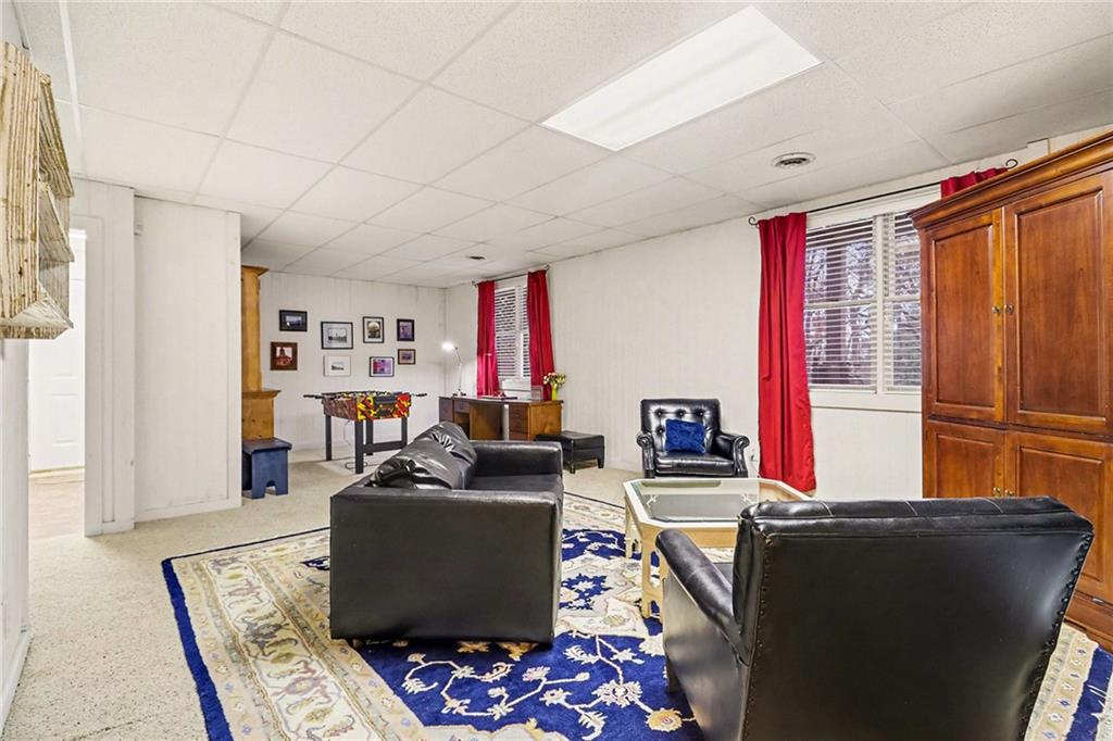296 Fairview Court Jasper, GA 30143 - Photo 22 of 40 a living room with furniture and a window