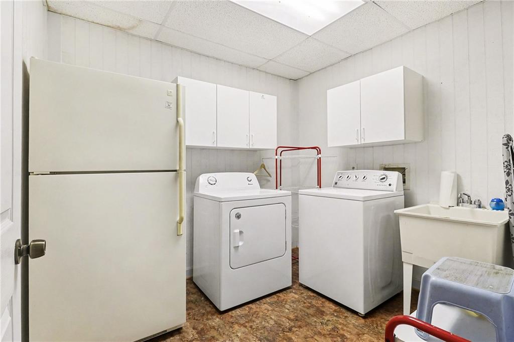 296 Fairview Court Jasper, GA 30143 - Photo 23 of 40 a utility room with dryer and washer