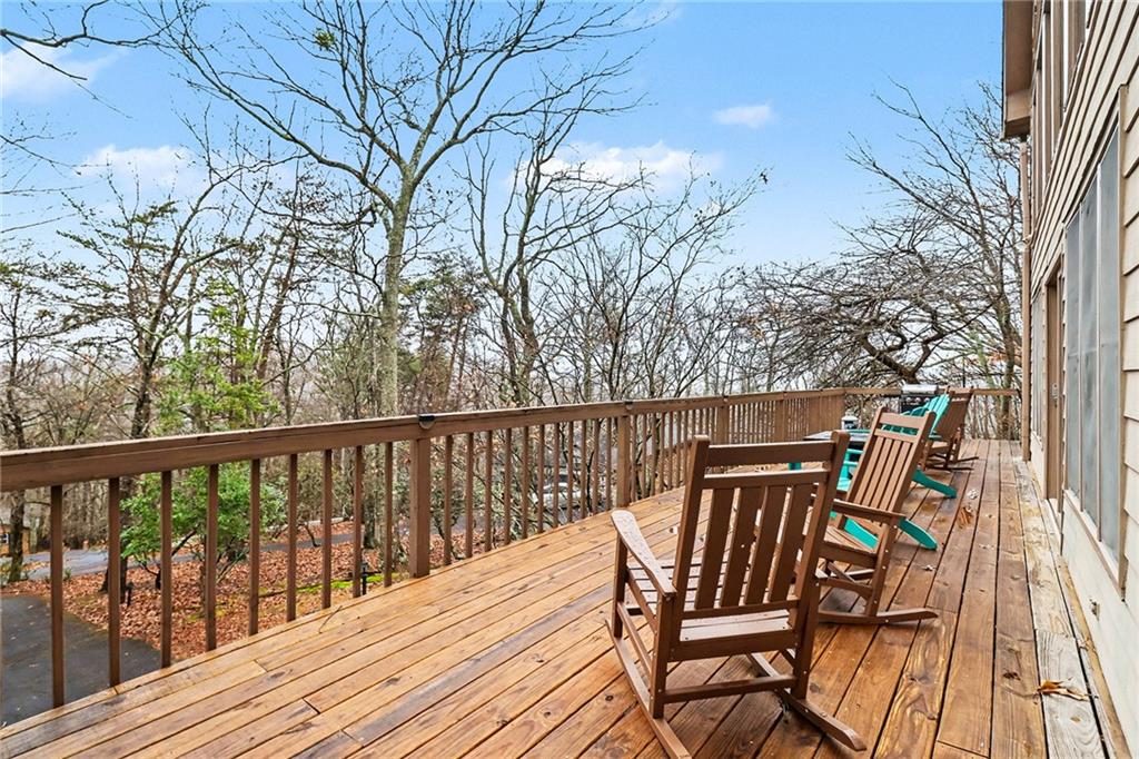 296 Fairview Court Jasper, GA 30143 - Photo 25 of 40 a view of balcony with wooden floor and outdoor seating
