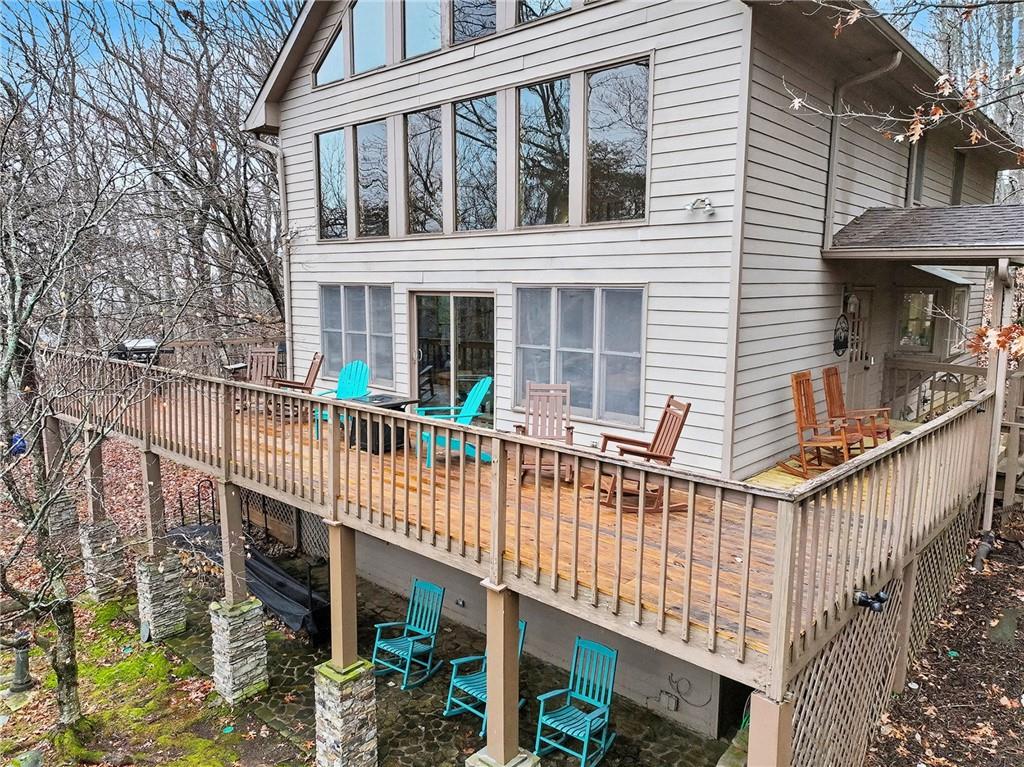 296 Fairview Court Jasper, GA 30143 - Photo 29 of 40 a view of a brick house with large windows