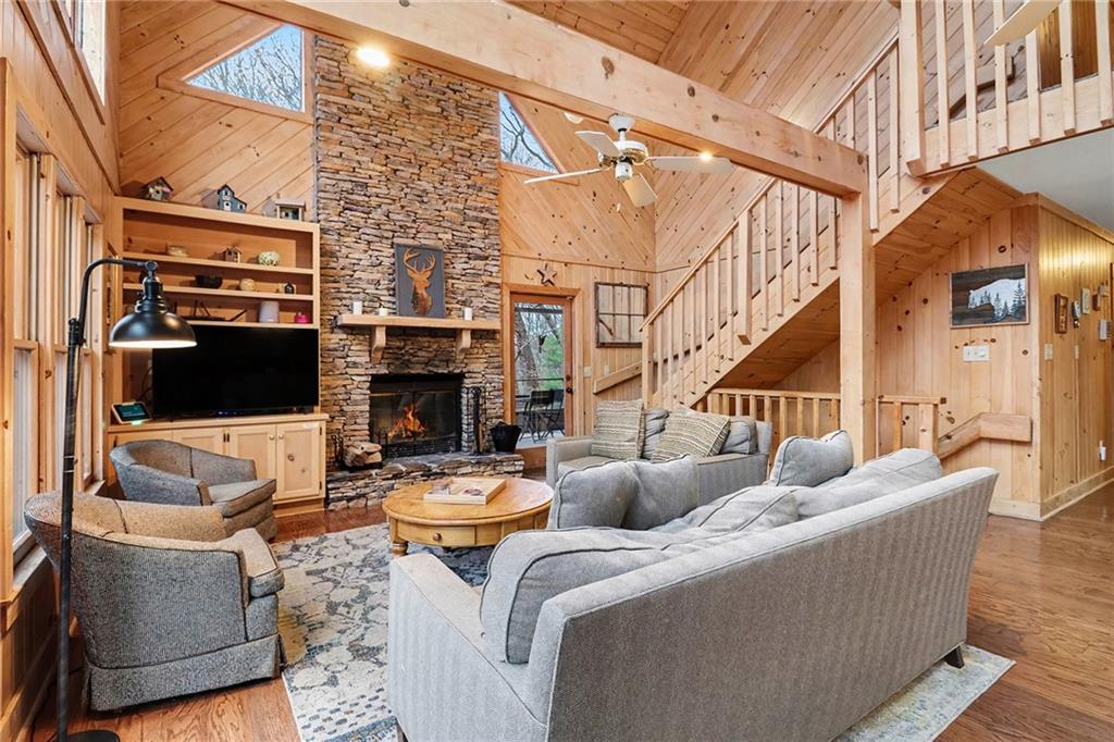 296 Fairview Court Jasper, GA 30143 - Photo 6 of 40 a living room with fireplace furniture and a fireplace