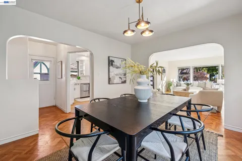 a spacious bedroom with a bed and a couch