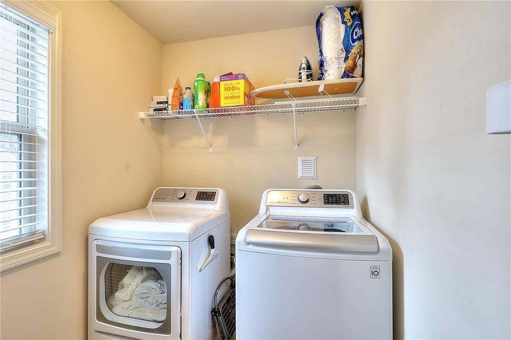 1306 Harris Way South Atlanta, GA 30319 - Photo 14 of 19 a utility room with dryer and washer