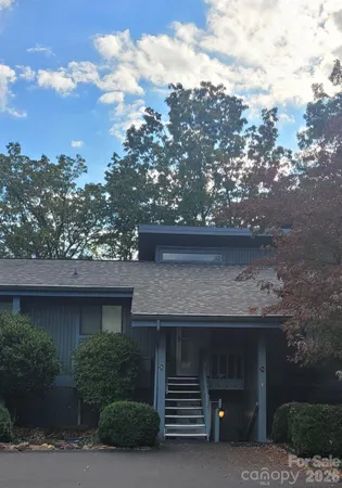 a room with gym equipment and a large window