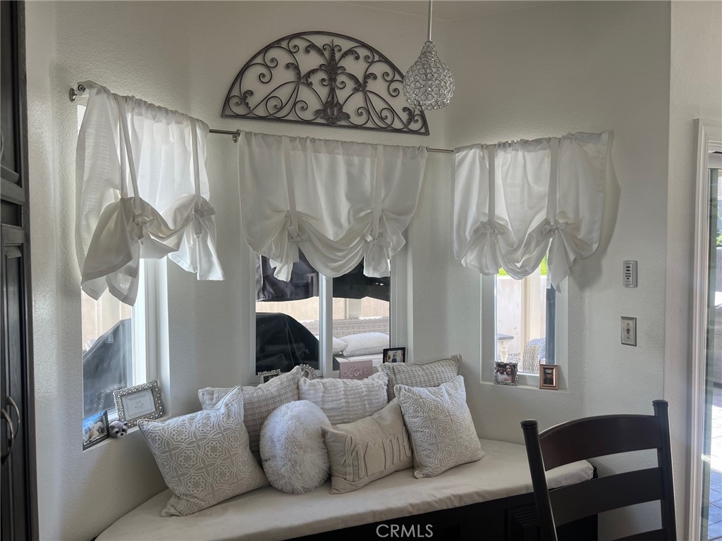 6105 Sherry Court Rancho Cucamonga, CA 91737 - Photo 14 of 35 a living room with furniture and a fireplace