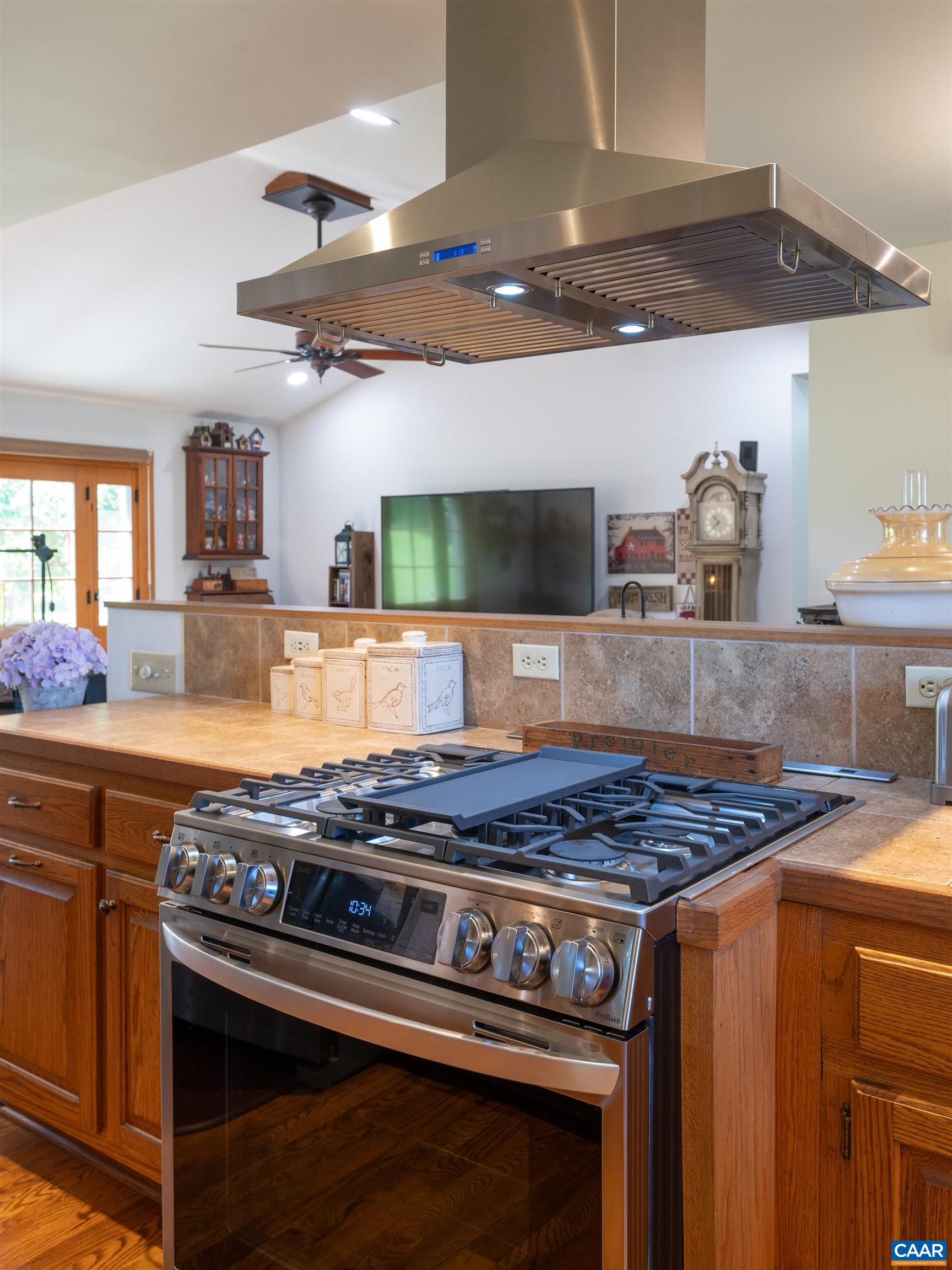 717 Barnhart Road Fort Defiance, VA 24437 - Photo 12 of 41 a kitchen with stainless steel appliances granite countertop a stove and a sink
