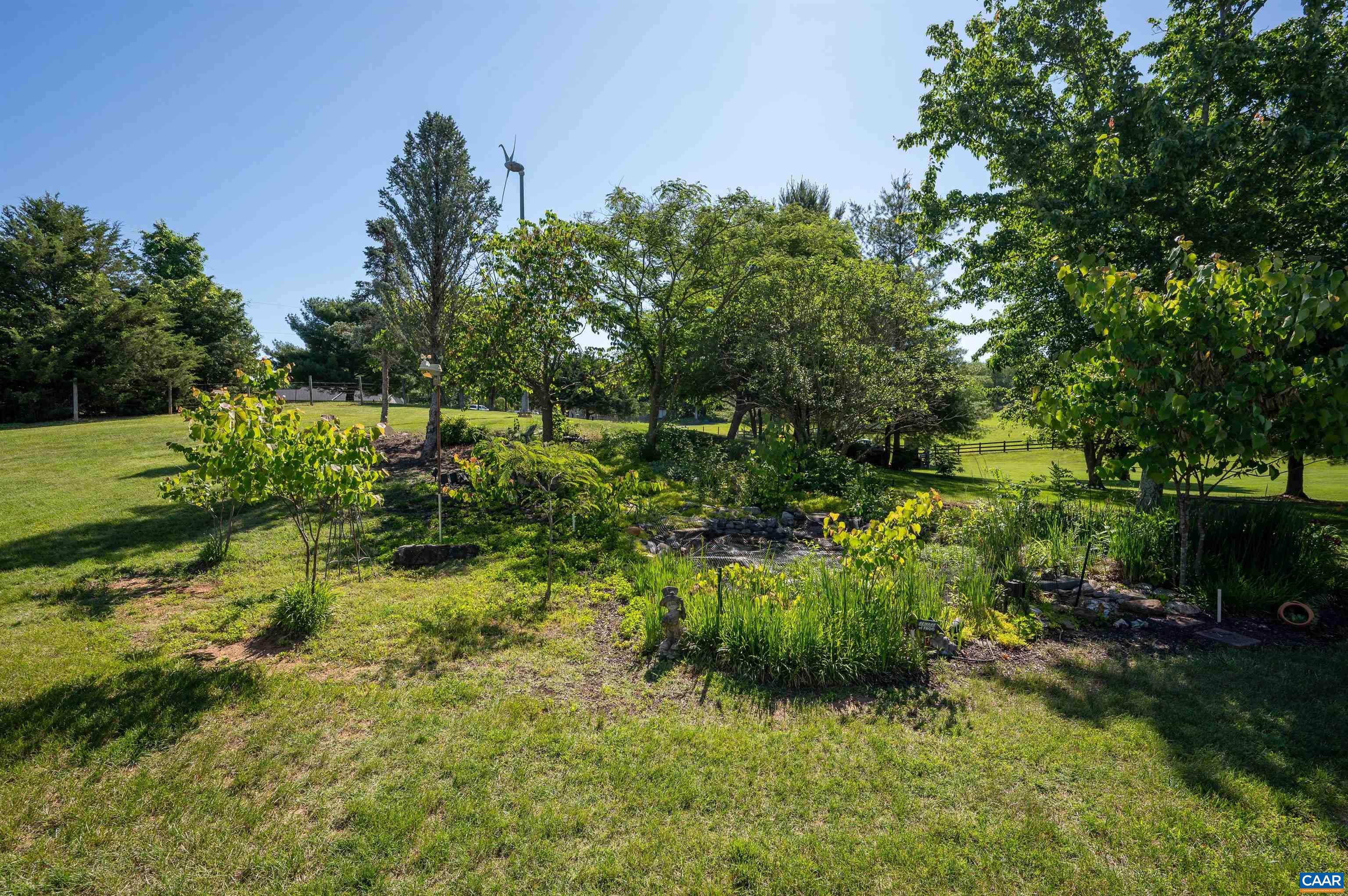 717 Barnhart Road Fort Defiance, VA 24437 - Photo 27 of 41 a view of a garden with a lake