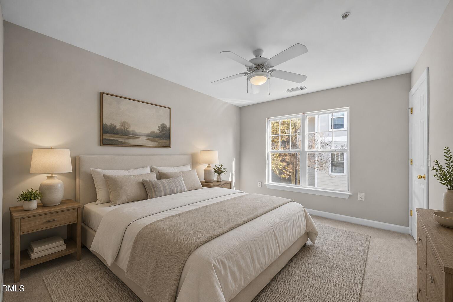 929 Morreene Road, Unit A23 Durham, NC 27705 - Photo 21 of 41 a bedroom with a large bed and a window