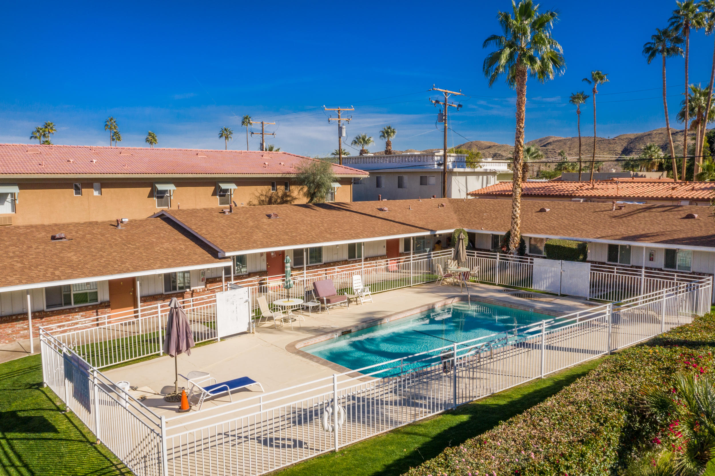 68365 Tahquitz Road Cathedral City, CA 92234 - Photo 1 of 14 a view of a swimming pool with a patio
