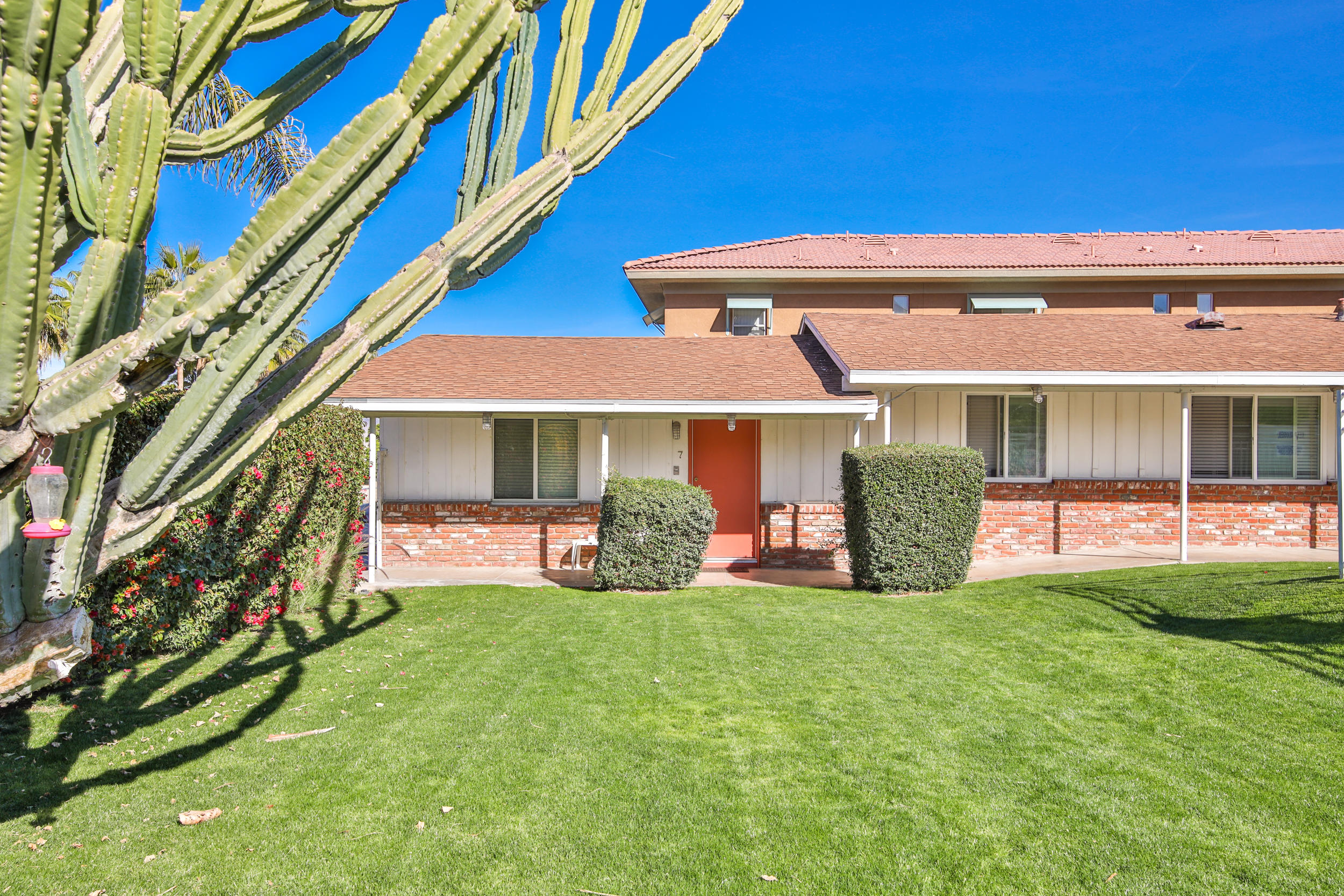 68365 Tahquitz Road Cathedral City, CA 92234 - Photo 7 of 14 a view of a house with swimming pool and porch