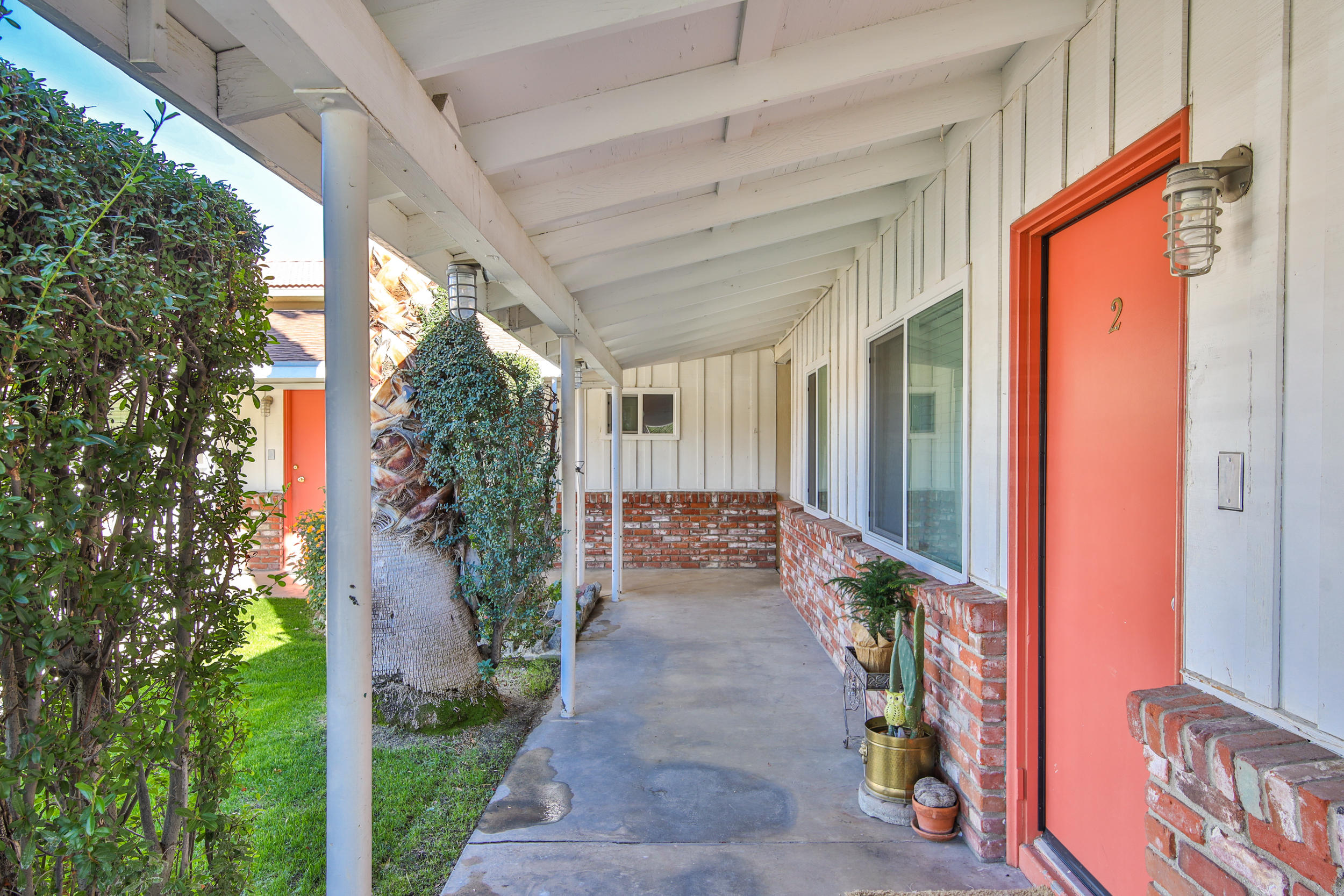 68365 Tahquitz Road Cathedral City, CA 92234 - Photo 10 of 14 a front view of a house with a porch