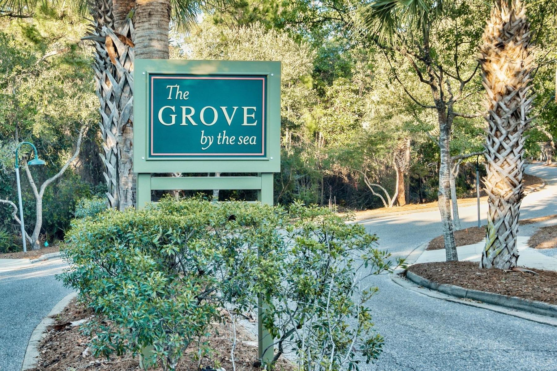 18 North Andalusia Avenue Santa Rosa Beach, FL 32459 - Photo 4 of 22 a sign that is on a brick wall