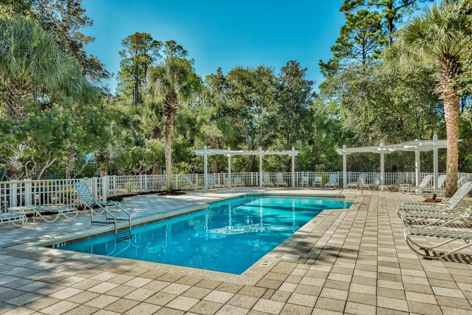 18 North Andalusia Avenue Santa Rosa Beach, FL 32459 - Photo 10 of 22 a view of a swimming pool with a yard