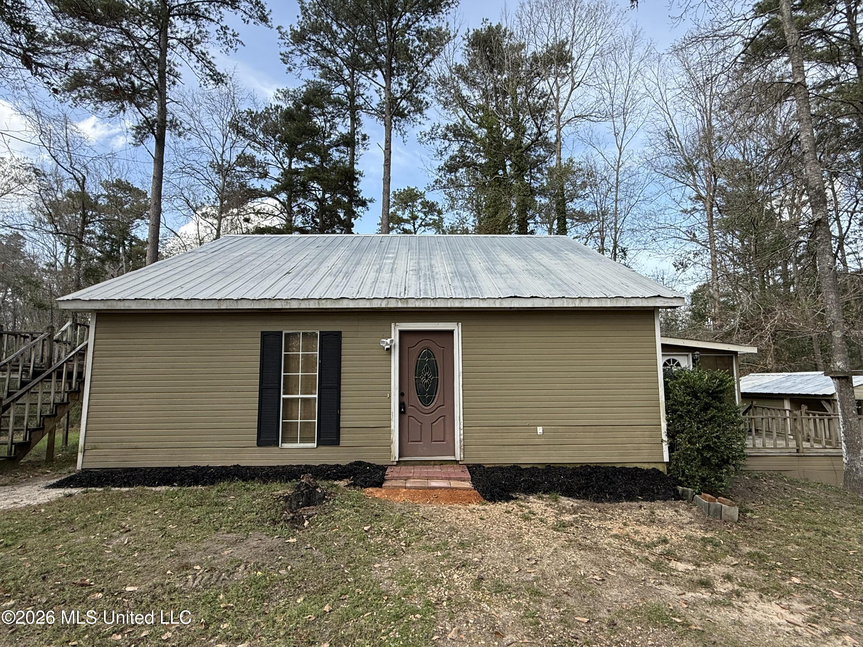 15489 Highway 18 Raleigh, MS 39153 - Photo 1 of 17 Front