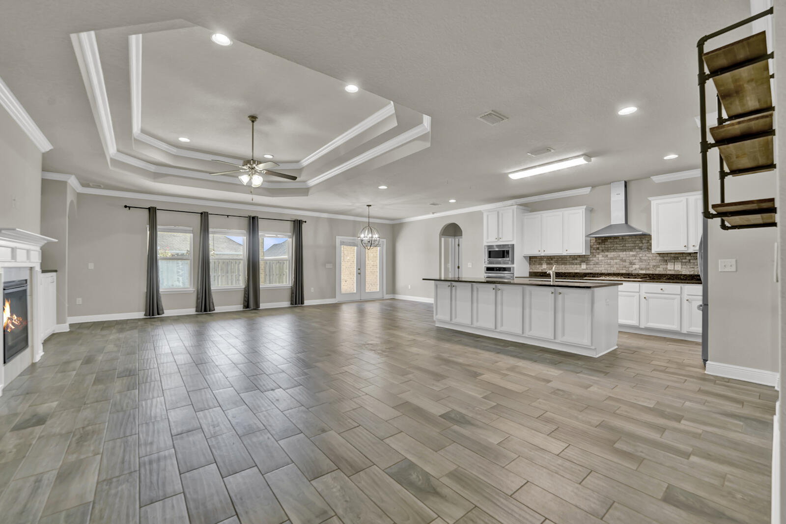 272 Lottie Loop Freeport, FL 32439 - Photo 1 of 53 a view of kitchen with cabinets and wooden floor