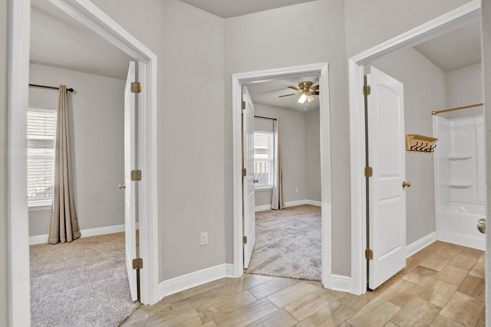 272 Lottie Loop Freeport, FL 32439 - Photo 21 of 53 a view of a hallway with wooden floor and front door