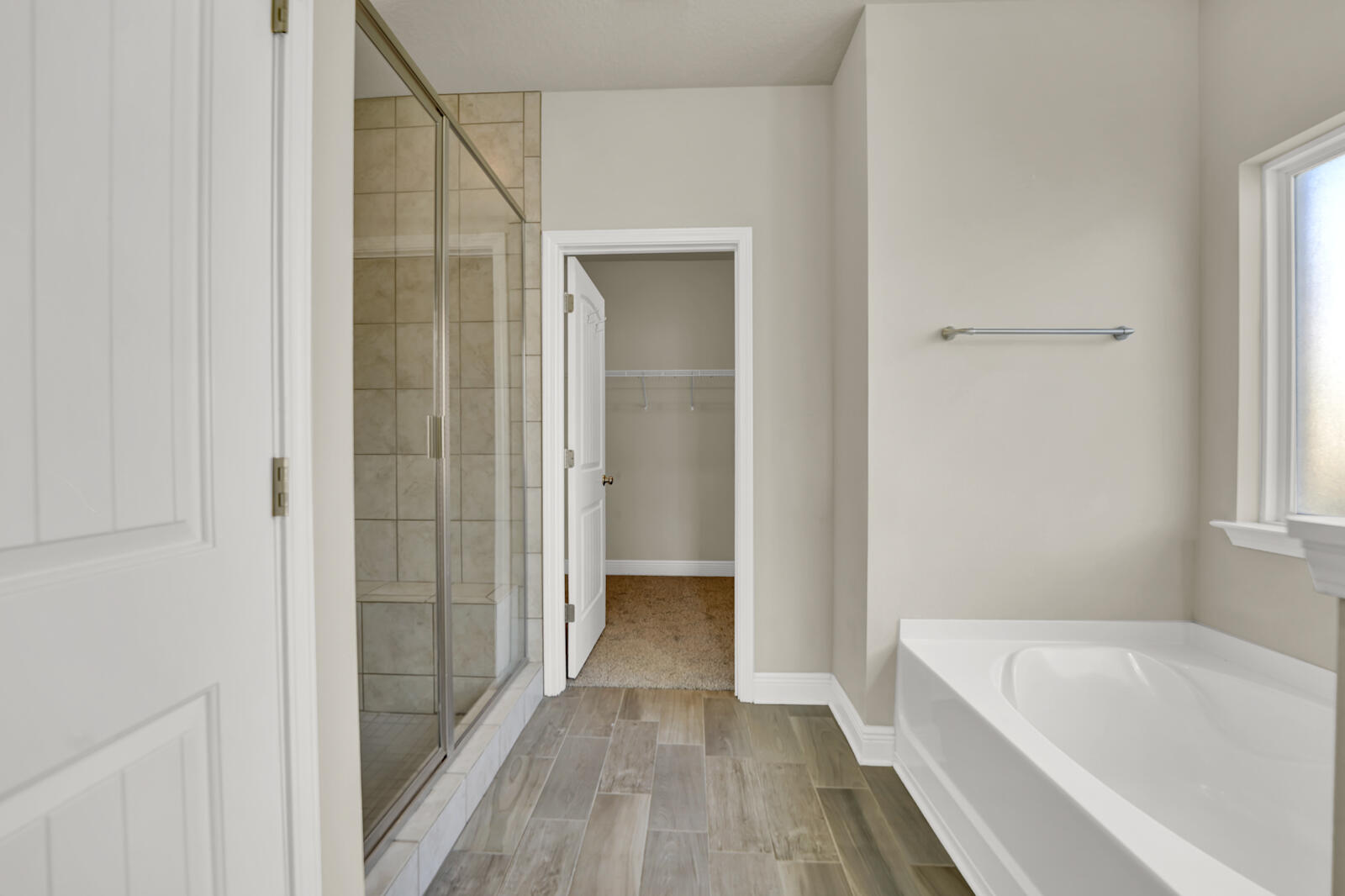 272 Lottie Loop Freeport, FL 32439 - Photo 32 of 53 a bathroom with a bathtub and a shower