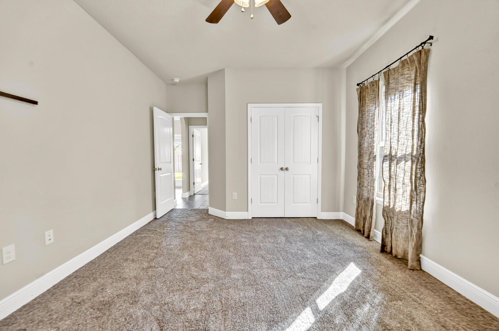 272 Lottie Loop Freeport, FL 32439 - Photo 42 of 53 wooden floor in an empty room with a window
