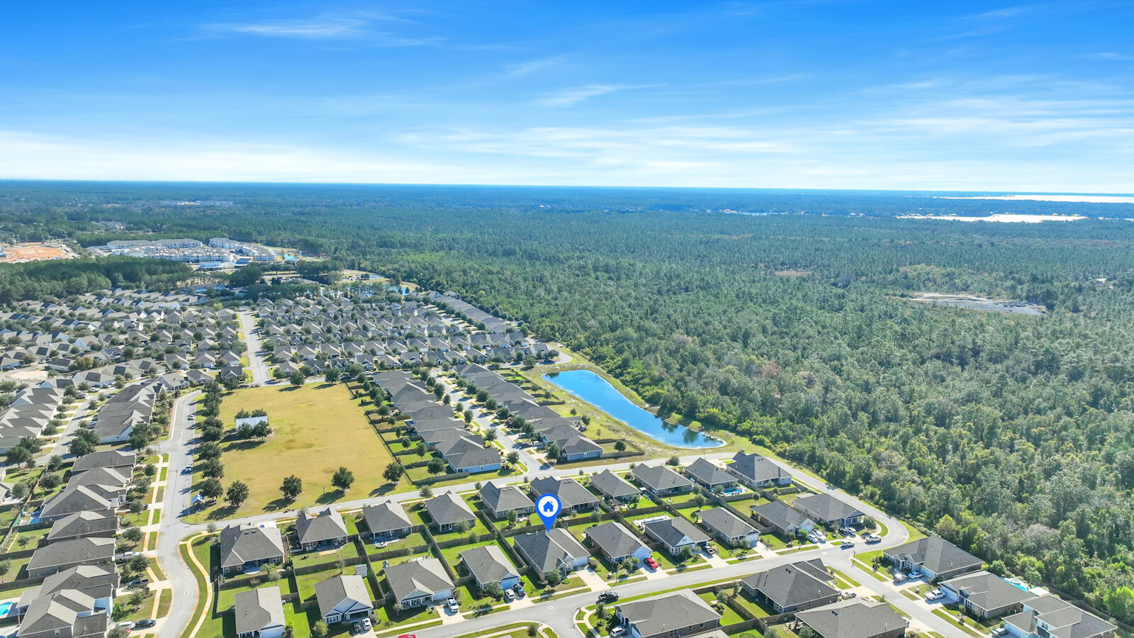 272 Lottie Loop Freeport, FL 32439 - Photo 49 of 53 an aerial view of residential houses with outdoor space