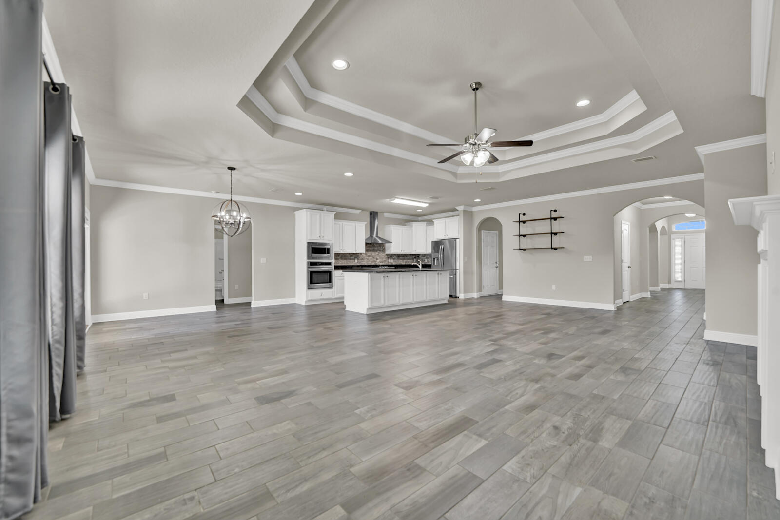 272 Lottie Loop Freeport, FL 32439 - Photo 5 of 53 a view of a kitchen with a sink and a refrigerator