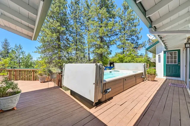 a view of a porch with a fence