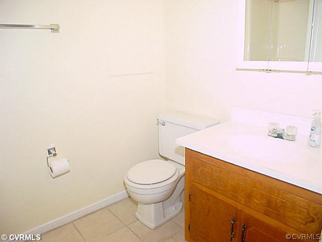 11124 Robious Road North Chesterfield, VA 23235 - Photo 11 of 22 a bathroom with a toilet and a sink