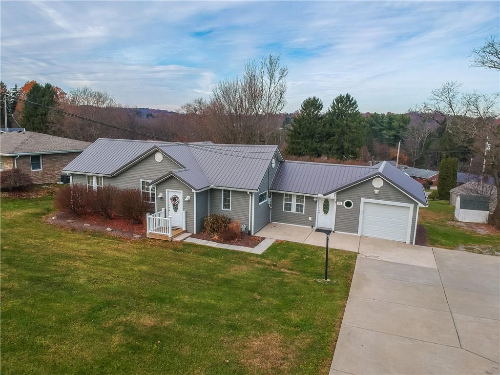 110 Oakville Road Beaver Falls, PA 15010 - Photo 2 of 48 Low maintenance metal roof is featured on this home.