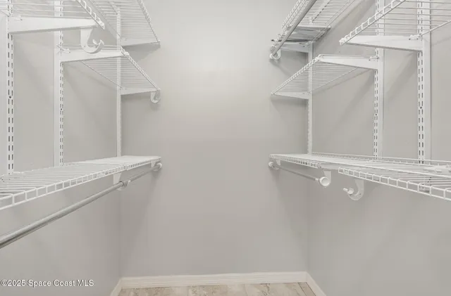 a view of a room with racks on the wall