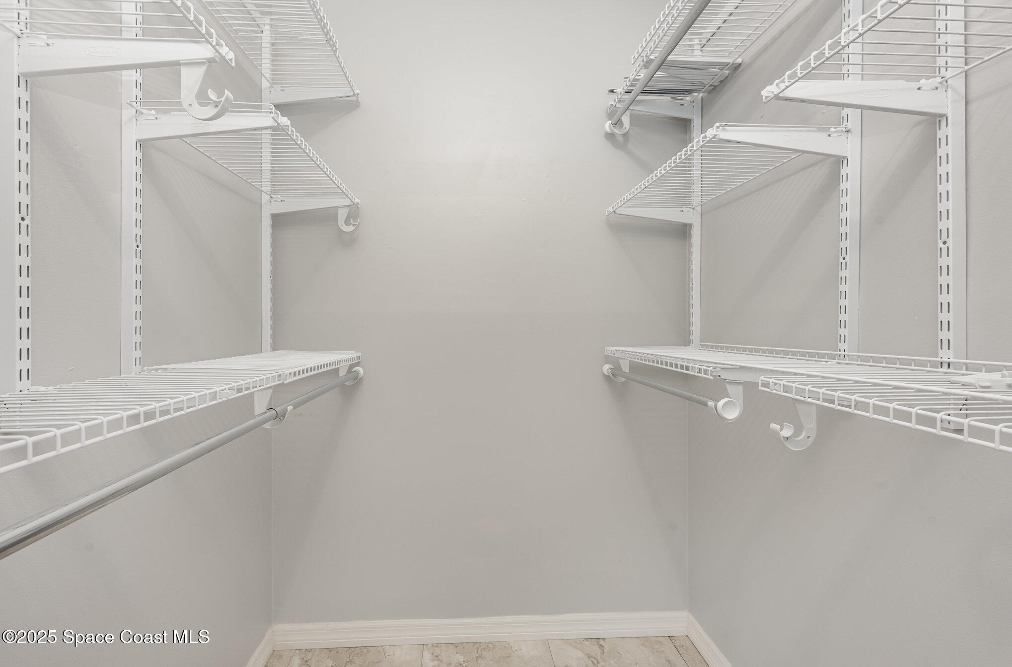 2935 Thrush Drive, Unit 144 Melbourne, FL 32935 - Photo 13 of 17 a view of a room with racks on the wall