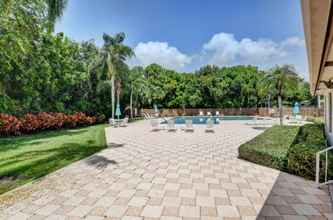 a outdoor space with swimming pool and furniture