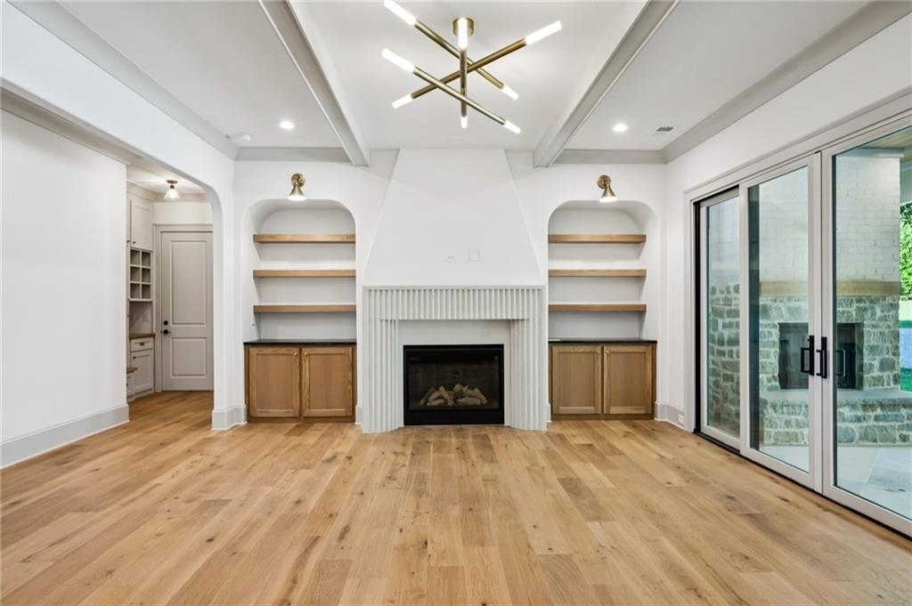 3756 Donaldson Drive Atlanta, GA 30341 - Photo 13 of 38 a view of a room with a fireplace cabinet and windows