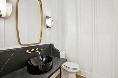 a view of staircase with wooden floor and a window