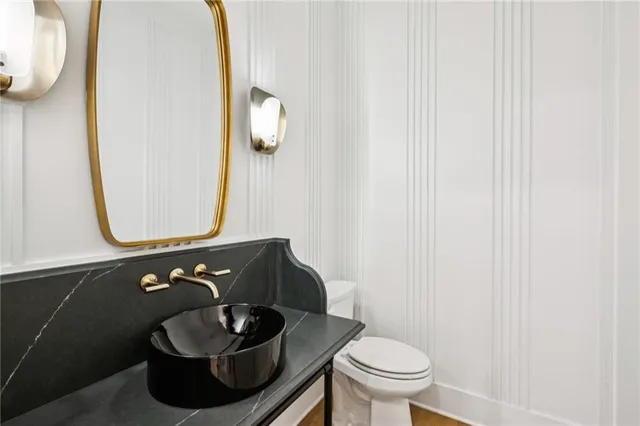 a view of staircase with wooden floor and a window