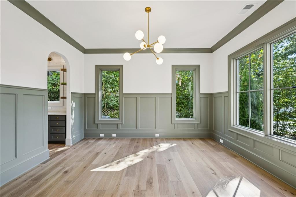 3756 Donaldson Drive Atlanta, GA 30341 - Photo 5 of 38 a view of an empty room with a window and kitchen view